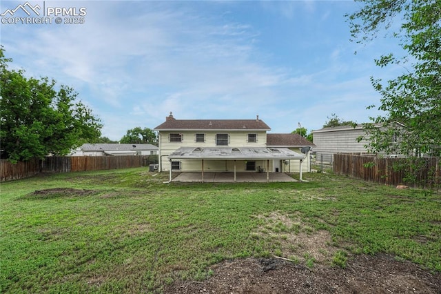 7108 Chippewa Rd, Colorado Springs, CO 80915 - back of house featuring a patio area, a fenced backyard, and a chimney