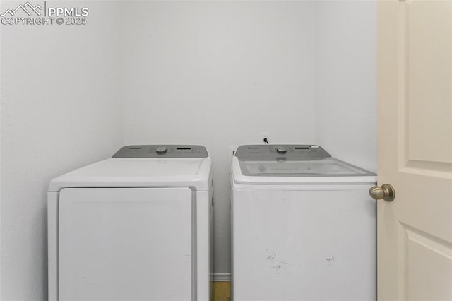 7711 Menagerie Ln, Colorado Springs, CO 80923 - washroom with separate washer and dryer