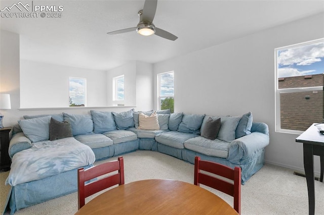 7711 Menagerie Ln, Colorado Springs, CO 80923 - living room with carpet flooring, a ceiling fan, and baseboards