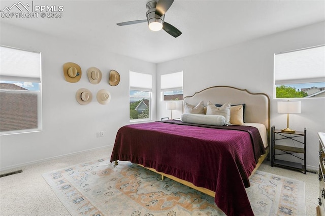 7711 Menagerie Ln, Colorado Springs, CO 80923 - carpeted bedroom with baseboards and a ceiling fan