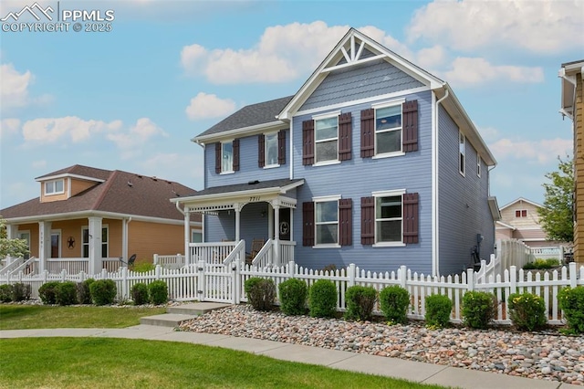 7711 Menagerie Ln, Colorado Springs, CO 80923 - view of front of property with covered porch and a fenced front yard