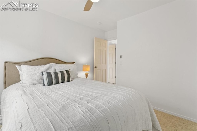 7711 Menagerie Ln, Colorado Springs, CO 80923 - bedroom with carpet, ceiling fan, and baseboards
