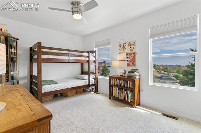 7711 Menagerie Ln, Colorado Springs, CO 80923 - bedroom with carpet floors, baseboards, and a ceiling fan