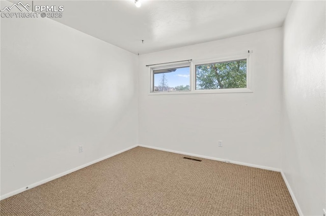 3510 Jon St, Colorado Springs, CO 80907 - empty room with carpet flooring and baseboards