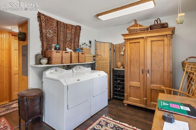 258 Shavano Creek Trl, Florissant, CO 80816 - laundry area featuring washer and dryer, electric panel, and dark wood-type flooring