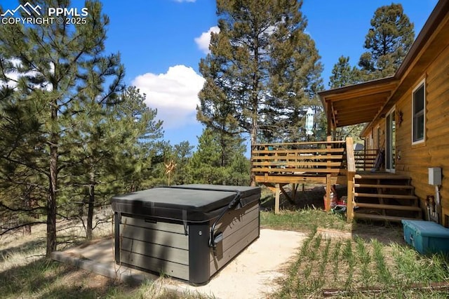 258 Shavano Creek Trl, Florissant, CO 80816 - view of yard featuring a hot tub and a wooden deck