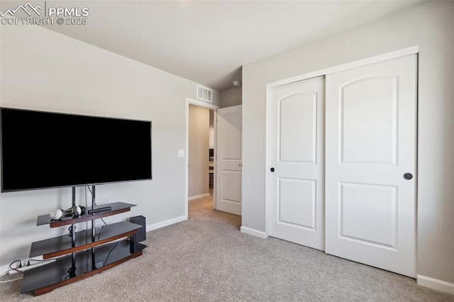 10671 Larimar Pt, Colorado Springs, CO 80905 - carpeted bedroom with baseboards and a closet