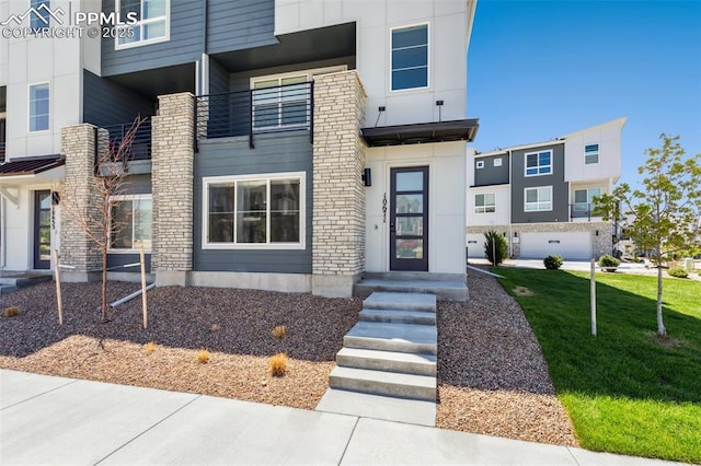 10671 Larimar Pt, Colorado Springs, CO 80905 - view of front facade with a front yard and stucco siding