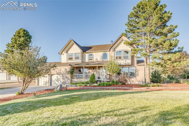 14915 Gleneagle Dr, Colorado Springs, CO 80921 - view of front of property with driveway, a porch, and a front lawn