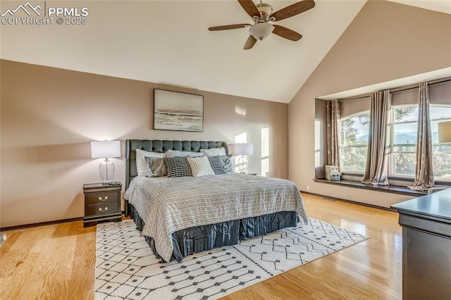 14915 Gleneagle Dr, Colorado Springs, CO 80921 - bedroom with high vaulted ceiling, light wood finished floors, and a ceiling fan