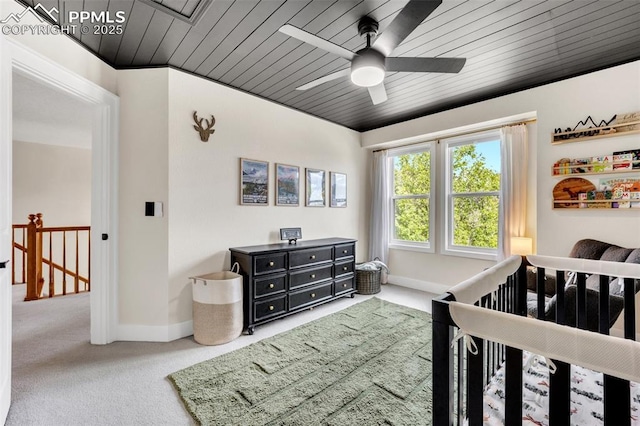 6390 Moccasin Pass Ct, Colorado Springs, CO 80919 - carpeted bedroom with baseboards, a ceiling fan, and wood ceiling