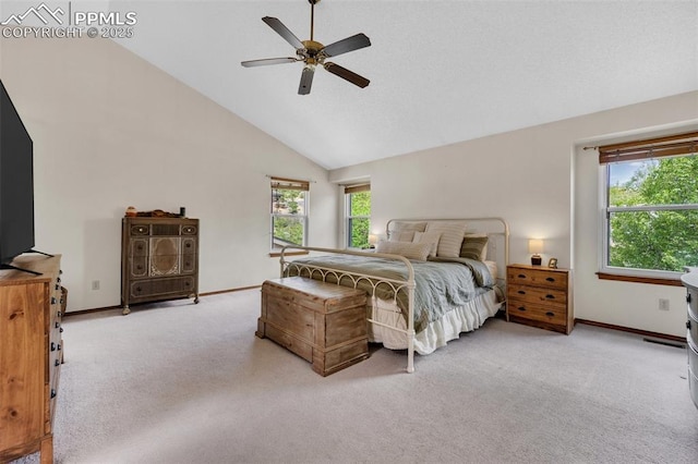 6390 Moccasin Pass Ct, Colorado Springs, CO 80919 - carpeted bedroom with baseboards, high vaulted ceiling, and ceiling fan