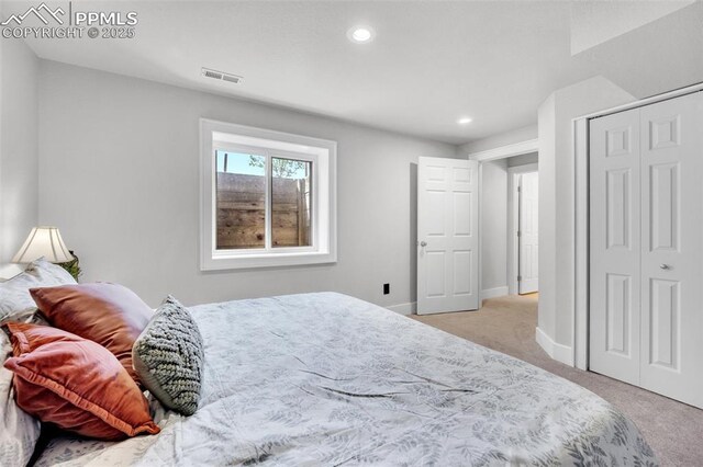 6390 Moccasin Pass Ct, Colorado Springs, CO 80919 - bedroom featuring carpet floors, recessed lighting, a closet, and baseboards
