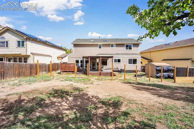6390 Moccasin Pass Ct, Colorado Springs, CO 80919 - rear view of property with a fenced backyard and a wooden deck