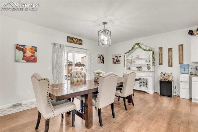 10140 Seawolf Dr, Colorado Springs, CO 80925 - dining space featuring light wood finished floors and baseboards