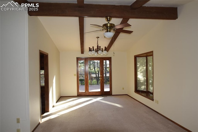 carpeted empty room with baseboards and a ceiling fan