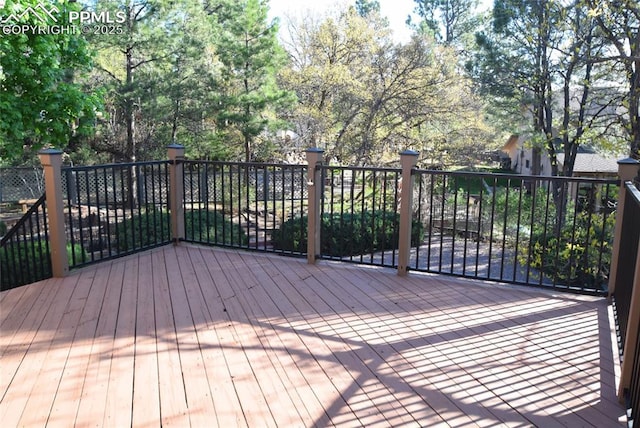 deck with view of wooded area