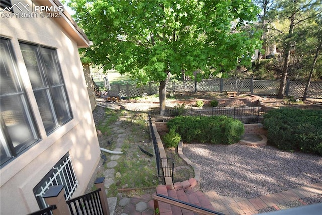 fenced backyard featuring a patio