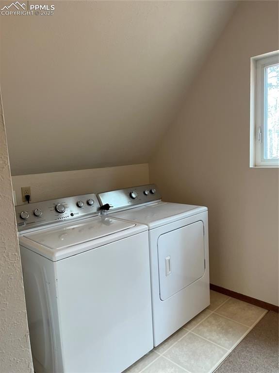 646 Grey Eagle Dr, Cripple Creek, CO 80813 - washroom featuring washer and dryer and light tile patterned flooring