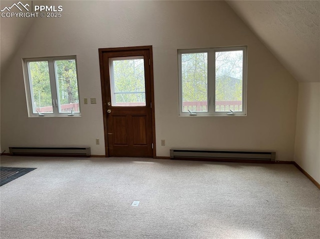 646 Grey Eagle Dr, Cripple Creek, CO 80813 - bonus room with vaulted ceiling, a baseboard heating unit, carpet, and plenty of natural light