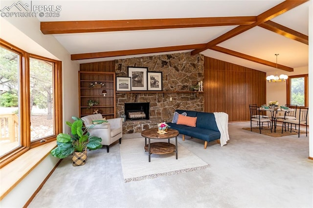 6331 Mesedge Dr, Colorado Springs, CO 80919 - carpeted living room with a chandelier and a fireplace