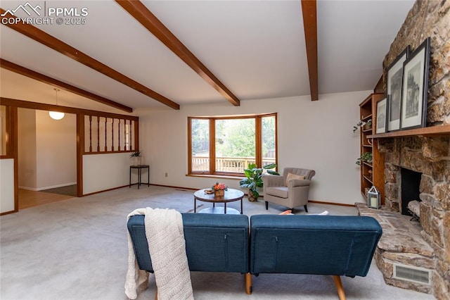 6331 Mesedge Dr, Colorado Springs, CO 80919 - living room with baseboards, carpet flooring, and a stone fireplace