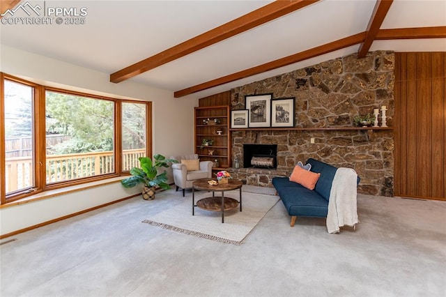 6331 Mesedge Dr, Colorado Springs, CO 80919 - carpeted living room featuring a fireplace and baseboards