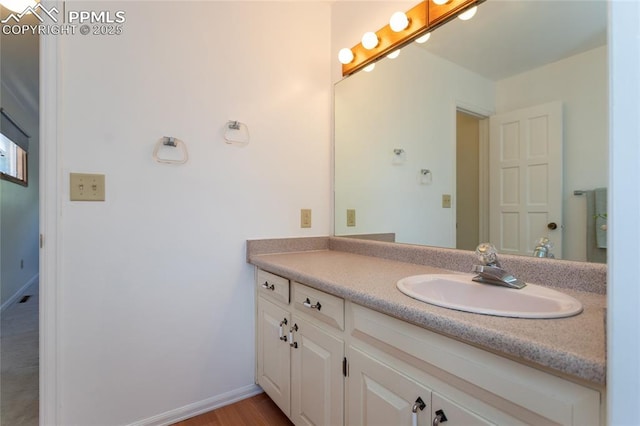6331 Mesedge Dr, Colorado Springs, CO 80919 - bathroom with vanity and baseboards