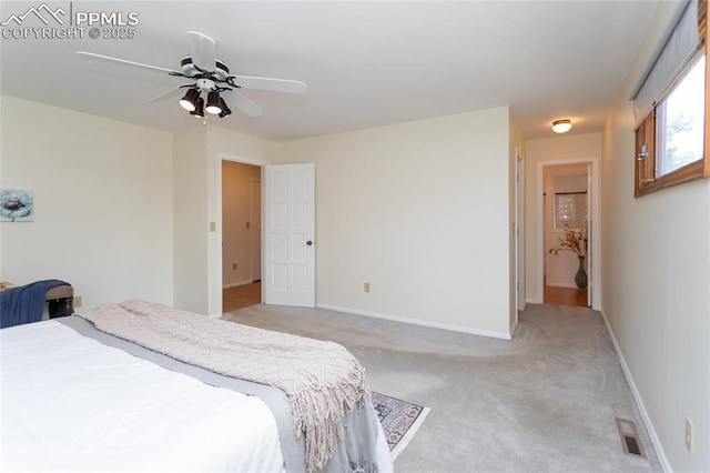 6331 Mesedge Dr, Colorado Springs, CO 80919 - bedroom featuring light carpet, ceiling fan, and baseboards