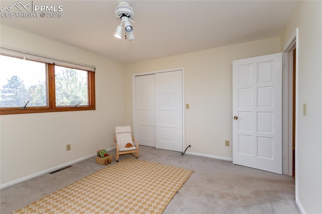 6331 Mesedge Dr, Colorado Springs, CO 80919 - unfurnished bedroom featuring light colored carpet, a closet, and baseboards
