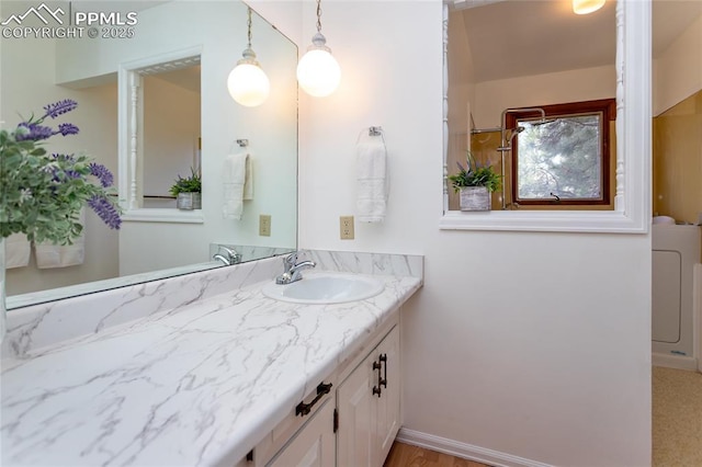 6331 Mesedge Dr, Colorado Springs, CO 80919 - bathroom featuring vanity and washer / dryer