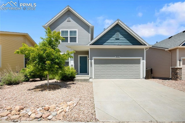 7682 Capel Pt, Peyton, CO 80831 - view of front of home featuring a garage and concrete driveway
