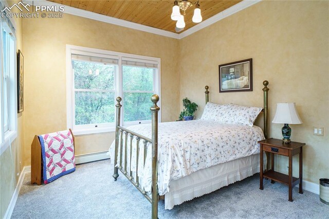 15 Cypress Ln, Colorado Springs, CO 80906 - bedroom with crown molding, carpet flooring, a baseboard radiator, a chandelier, and wood ceiling