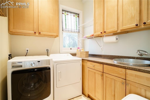 15 Cypress Ln, Colorado Springs, CO 80906 - laundry area featuring washer and clothes dryer and cabinet space