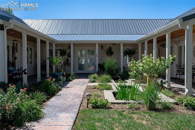 15 Cypress Ln, Colorado Springs, CO 80906 - entrance to property with french doors and metal roof