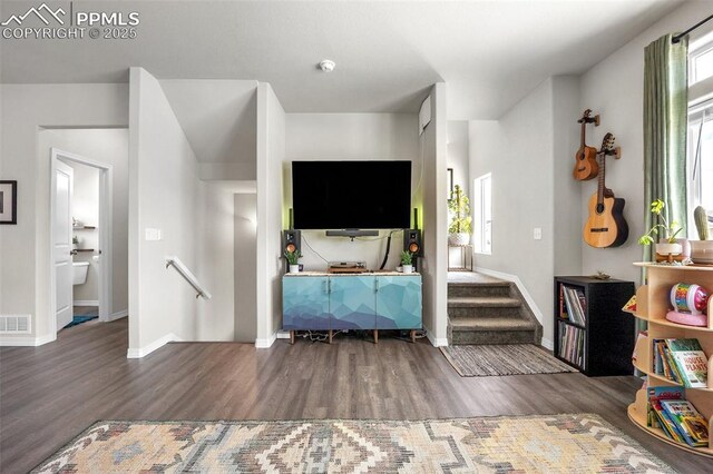 793 Grissom Dr, Colorado Springs, CO 80915 - living room featuring wood finished floors and baseboards