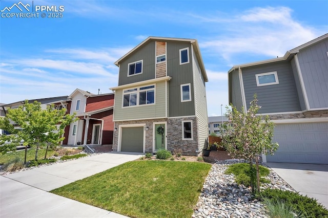 793 Grissom Dr, Colorado Springs, CO 80915 - modern home with concrete driveway, stone siding, an attached garage, and a front yard