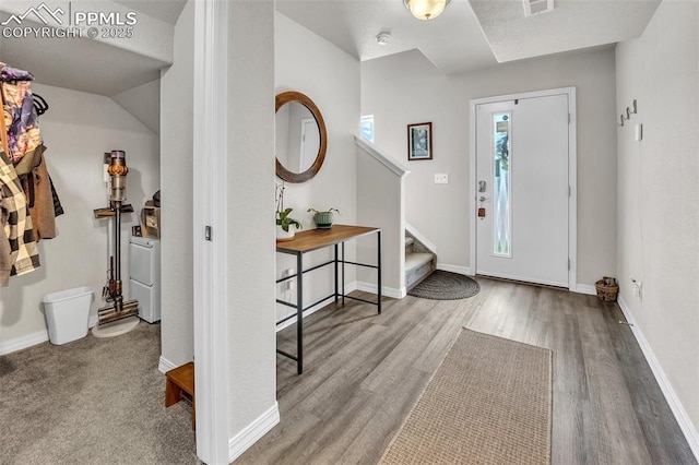 793 Grissom Dr, Colorado Springs, CO 80915 - foyer with stairway, wood finished floors, and baseboards