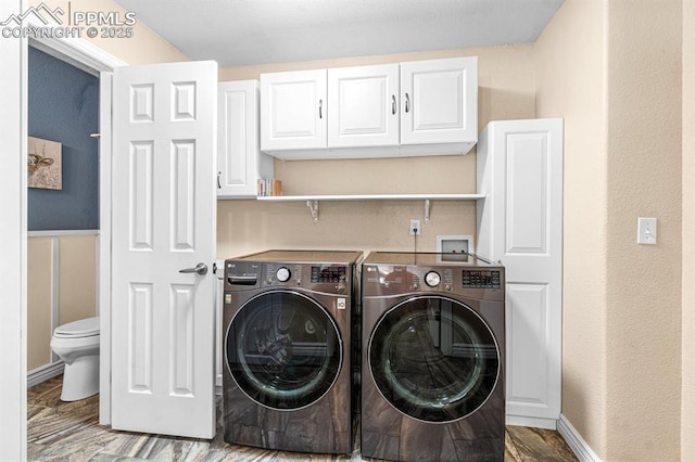 8020 Firecracker Trl, Fountain, CO 80817 - laundry room with separate washer and dryer, cabinet space, and baseboards