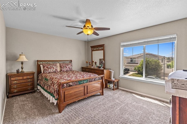 8020 Firecracker Trl, Fountain, CO 80817 - carpeted bedroom with a ceiling fan, a textured ceiling, and baseboards