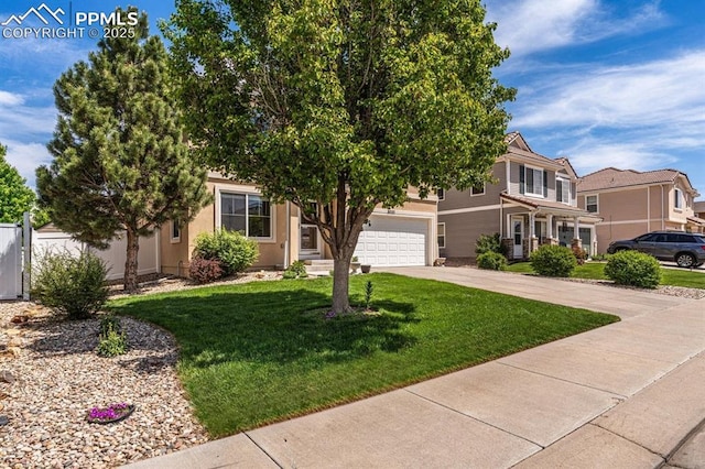 8020 Firecracker Trl, Fountain, CO 80817 - view of property hidden behind natural elements featuring concrete driveway and a front lawn