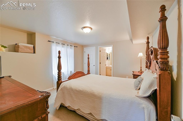 6463 Binder Dr, Colorado Springs, CO 80923 - carpeted bedroom with connected bathroom and baseboards