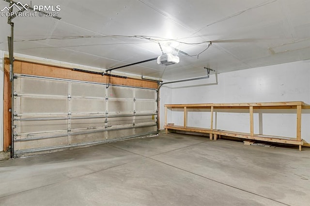 3300 W Florida Ave Unit 26, Denver, CO 80219 - garage featuring a garage door opener