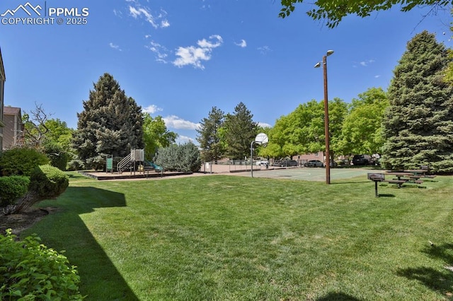 3300 W Florida Ave Unit 26, Denver, CO 80219 - view of property's community featuring community basketball court and a lawn