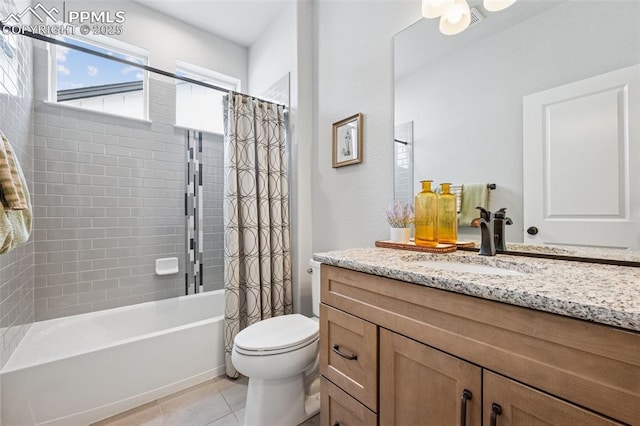 2267 Merlot Dr, Colorado Springs, CO 80921 - full bath with vanity, toilet, tile patterned floors, and shower / bath combo with shower curtain