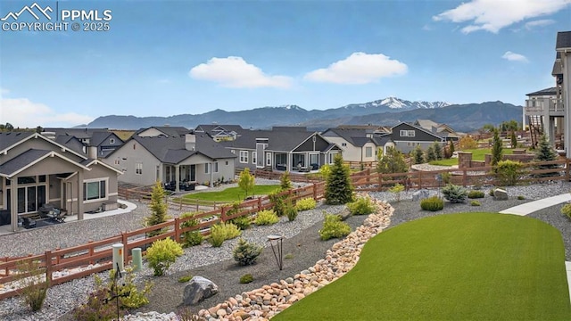 2267 Merlot Dr, Colorado Springs, CO 80921 - view of community with a residential view, a fenced backyard, and a mountain view