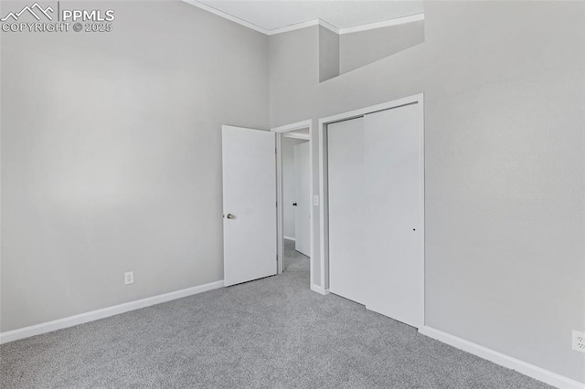4465 Archwood Dr, Colorado Springs, CO 80920 - unfurnished bedroom with carpet floors, baseboards, a closet, and ornamental molding