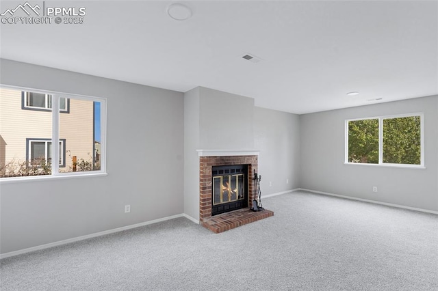 4465 Archwood Dr, Colorado Springs, CO 80920 - unfurnished living room with a fireplace, carpet floors, and baseboards