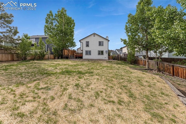 4465 Archwood Dr, Colorado Springs, CO 80920 - view of yard with a wooden deck