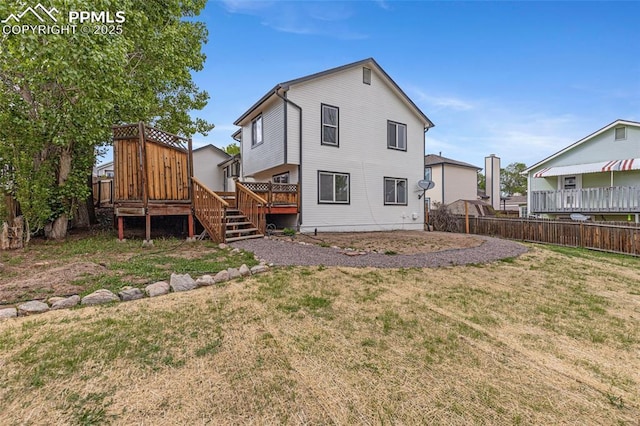 4465 Archwood Dr, Colorado Springs, CO 80920 - back of house featuring a wooden deck and stairs